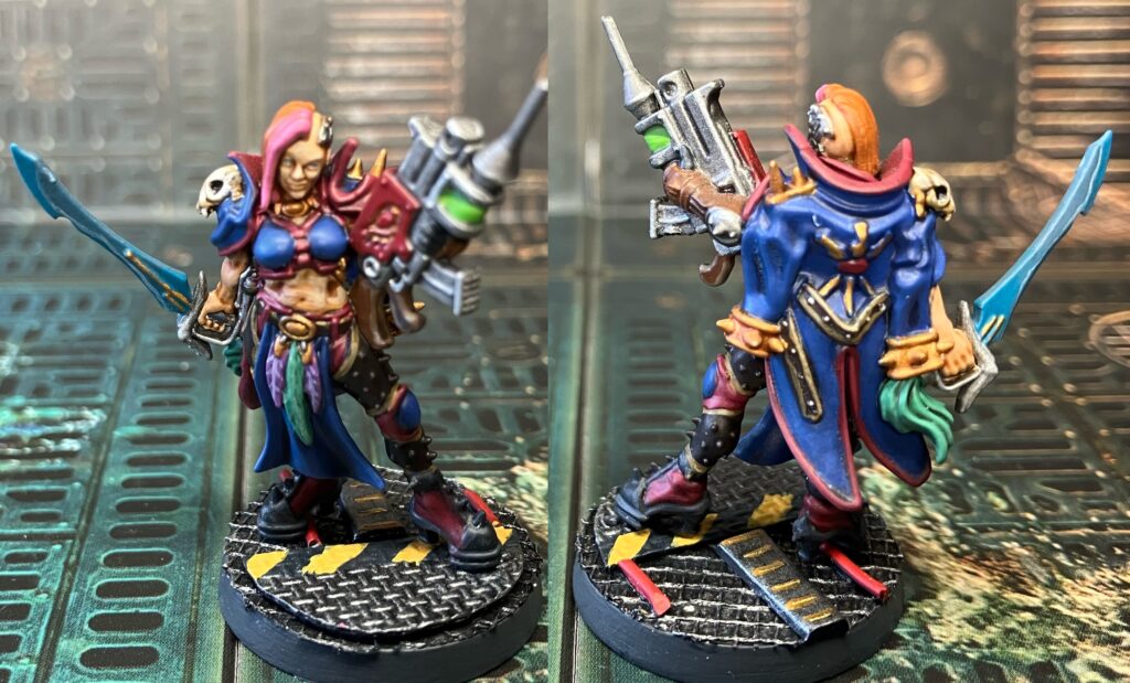 An Escher gang queen with a power sword and combi-bolter/needler