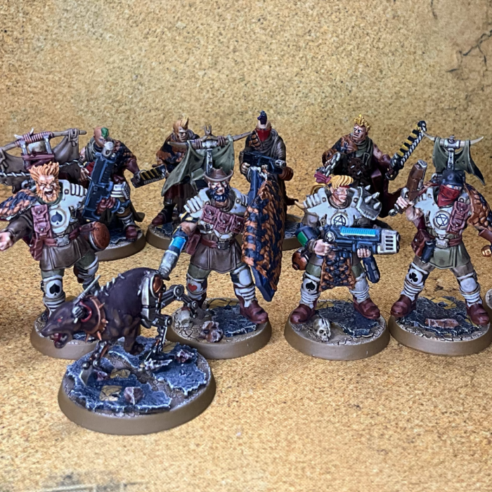 A badzone enforcer gang lined up in the Ash Wastes