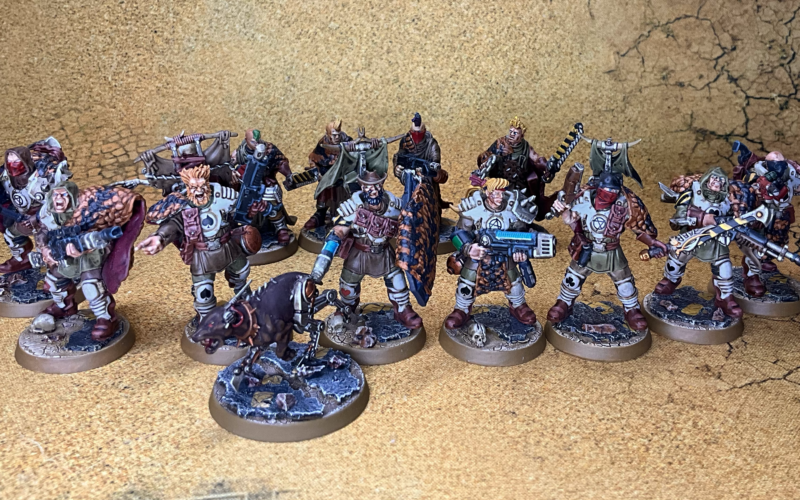 A badzone enforcer gang lined up in the Ash Wastes