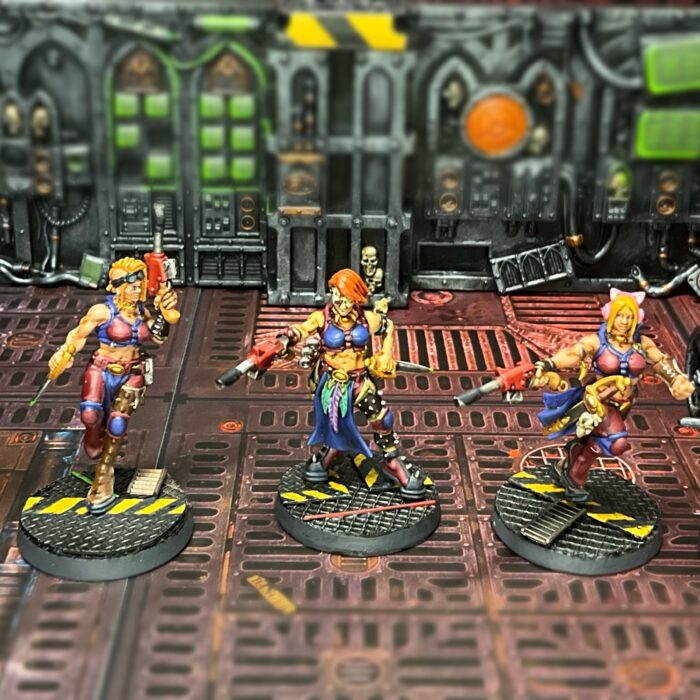 Three Escher juves, all with lasguns