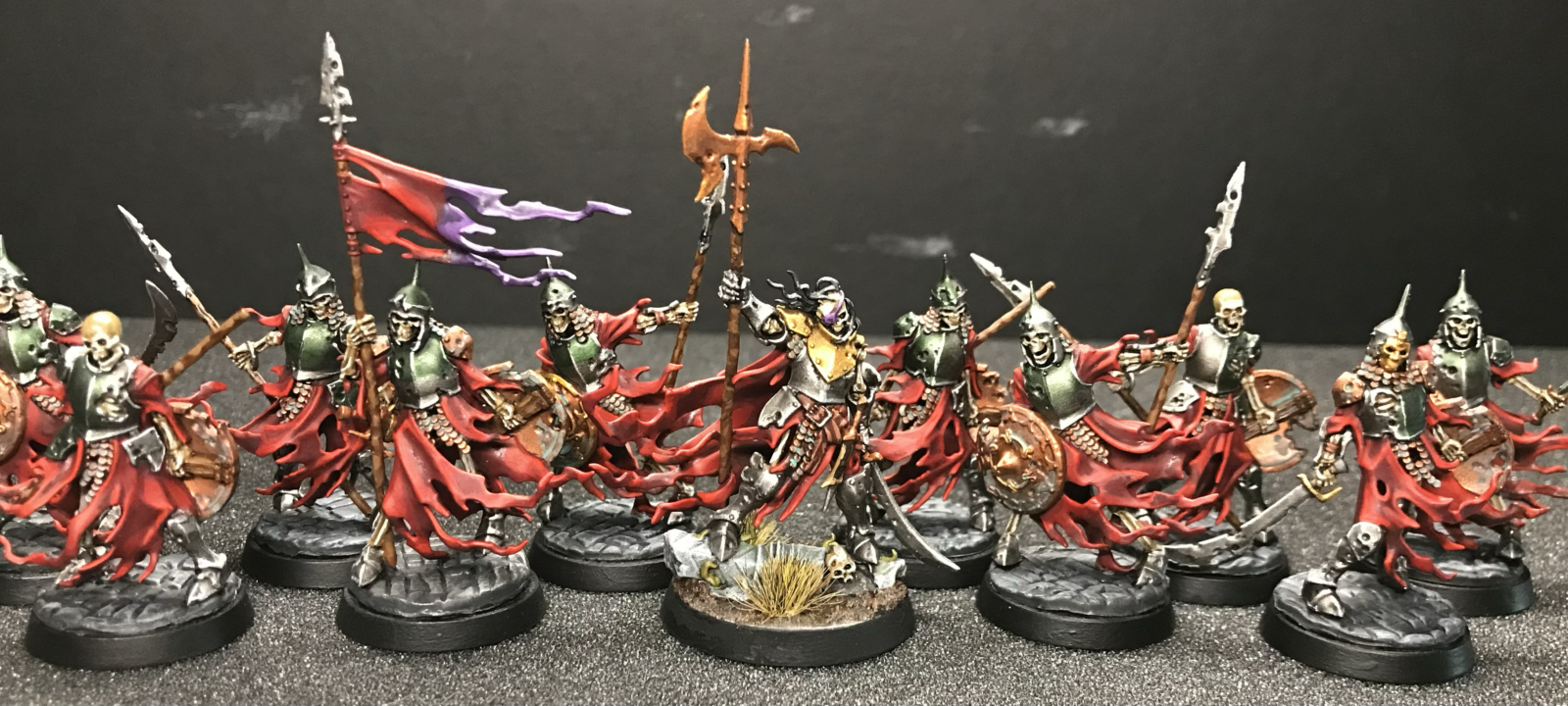 A group of skeleton miniatures lead by the Watch Captain Halgrim.