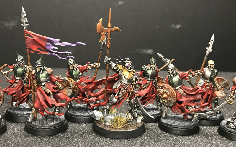 A group of skeleton miniatures lead by the Watch Captain Halgrim.
