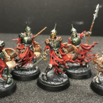 Death watch skeletons on green stuff custom cobble stone bases.