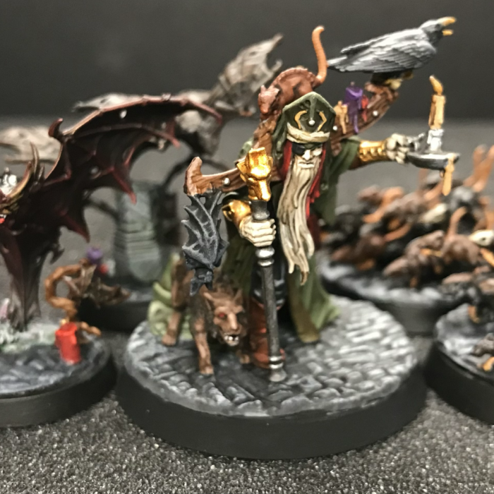 Torgillius the Chamberlain leads his bats and rats on green stuff modeled cobblestone bases.