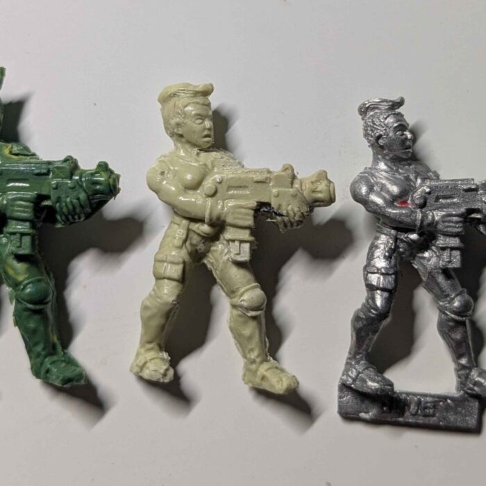A mini cast in green stuff and Milliput versus the original.