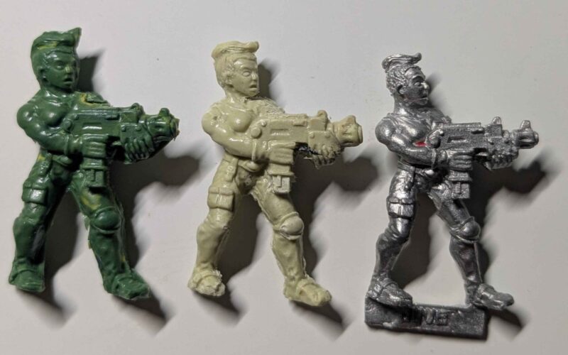 A mini cast in green stuff and Milliput versus the original.