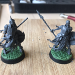 Cursed City skeleton miniatures mounted on their cobble stone base toppers.