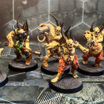 The six poxwalkers that come with this set painted in a yellow-ish green slap chop style