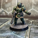 A hero guardsman with his las gun and a grenade.