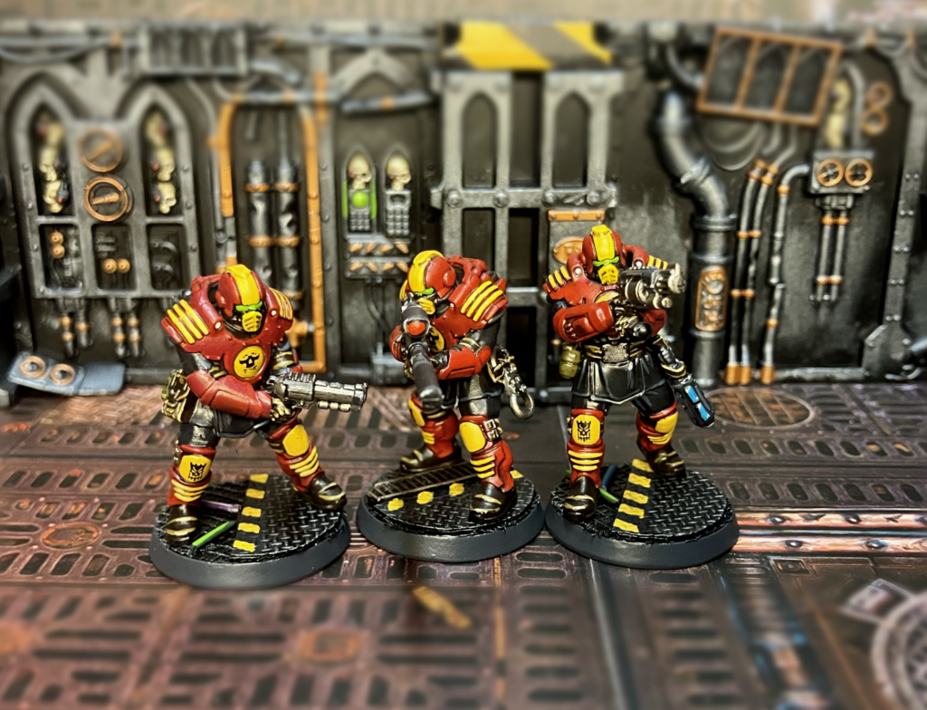 Two Palanite Enforcers with pistols, one with a sniper rifle.
