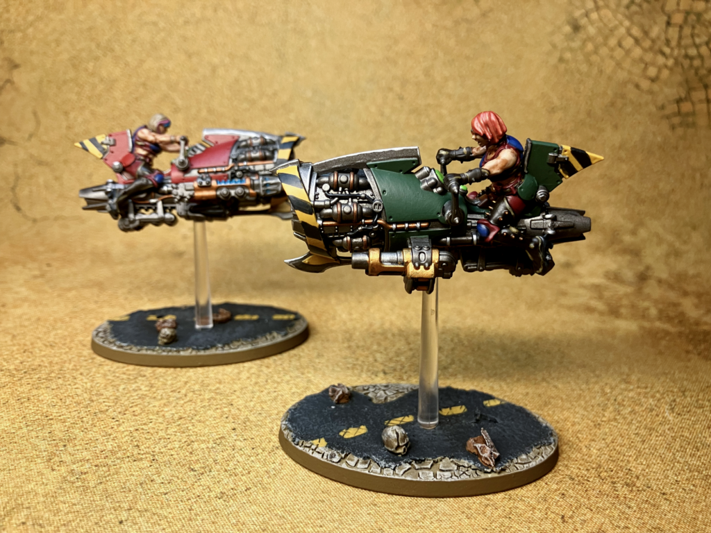 Two Escher Jetbikes passing each other at hight speed.