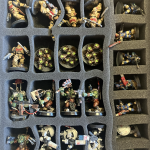 Space Marines, guard, Orks, and Tau all in protective foam.