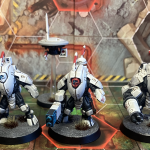 Tau Battlesuits in white and black