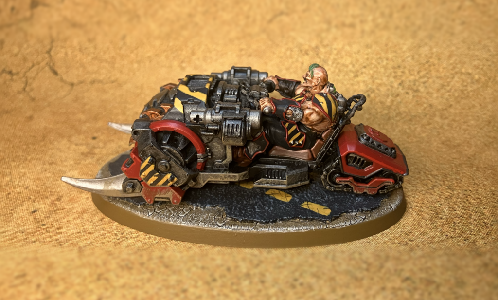 A Goliath Mauler from profile with all its hazard stripes