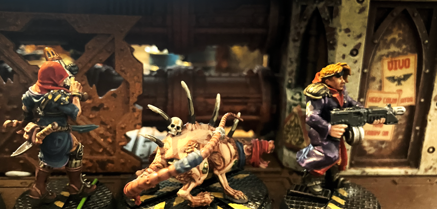 Psyker Sarah, a giant hive rat, and a scummer