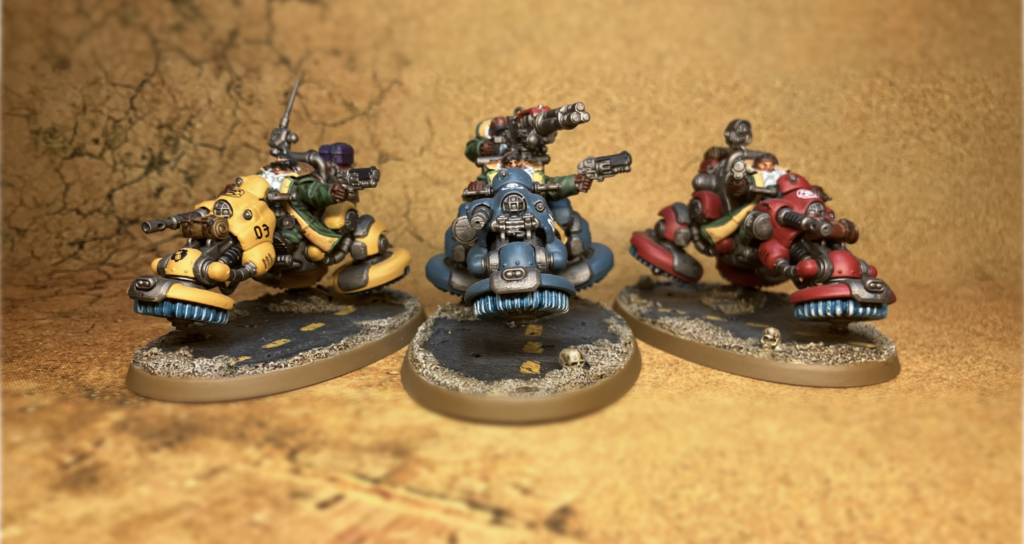 Three Ironhead Squat hoverbikes facing forward.