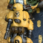 A 03, dice, and skill logo on a yellow squat hoverbike.
