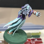 Gretchen Wächter from the front, arm outstretched with knuckle dusters