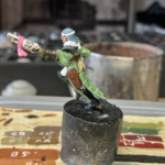 A juve for the new Roses of Saint Sydrena gang as seen from the side. A kitbashed Sororitas model being used as an Escher ganger.
