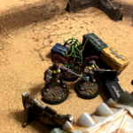 Escher sisters lined up behind some barricades in Necromunda