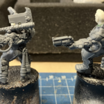 Two new Goliath models with head swaps, unpainted and mounted on corks.