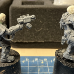 Two new Goliath models with head swaps, unpainted and mounted on corks.