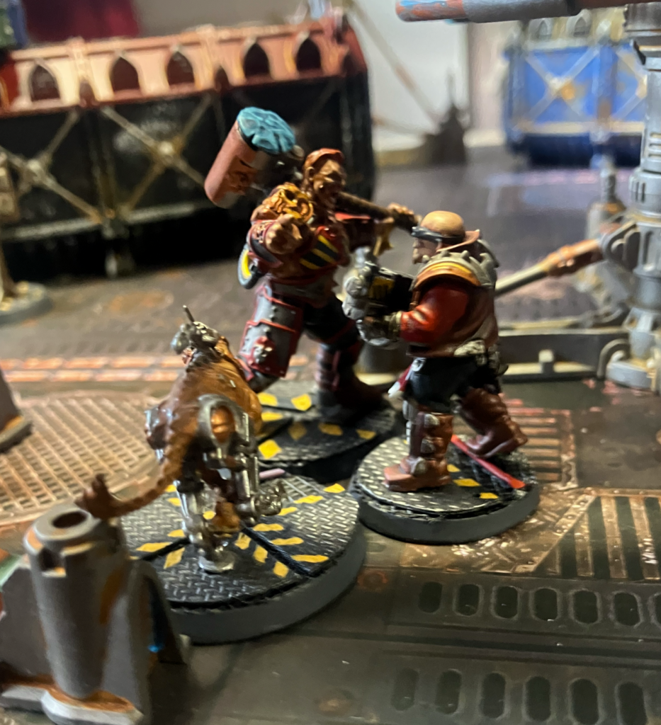 An Orlock Ganger Fights a Goliath Tyrant