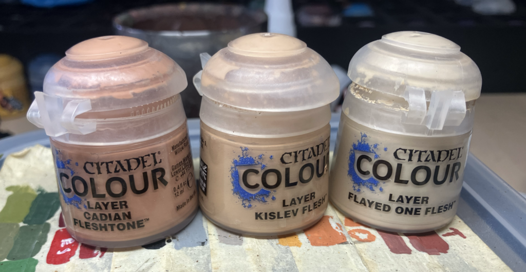 Three paints used for good white skin painting.