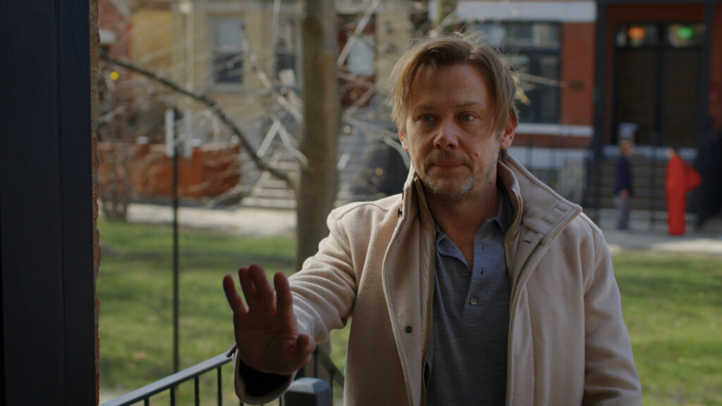 A still from Dark Matter, Ryan tries to explain himself to his sister in a different world