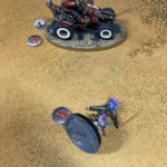 An Orlock Quad circles an Escher Death Maiden to run her over again.