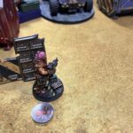 An Orlock autogunner lurks behind cover in the Ash Wastes