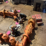 Two goliaths and an orlock in battle